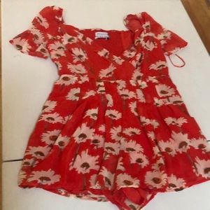 Urban Outfitters size small red floral print romper lined with side zipper